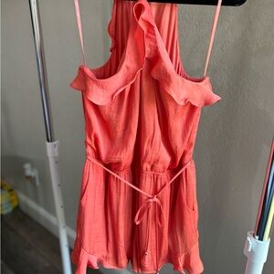 Etiquette Clothiers Orange Jumpsuit with Deep V-neckline